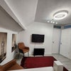 Photo 8: Top floor open plan living area furnished