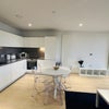 Photo 6: Fully equipped contemporary kitchen
