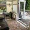 Photo 7: Second recreational room with t.v and recliner sofa. Beautiful view of the garden and woodland.