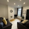 Photo 4: Living room.