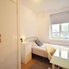 Photo 7: Neat, modern room
