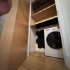 Photo 7: washer-dryer/storage