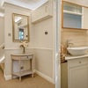 Photo 2: Entrance hallway + WC