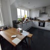 Photo 5: The spacious kitchen with the dining table too!