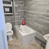 Photo 4: 1st floor bathroom 