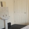 Photo 4: Ground floor single room with shower and washbasin