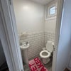 Photo 7: Downstaira toilet