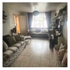 Photo 4: Living room (shared) 