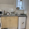 Photo 4: Kitchen (sink and fridge)