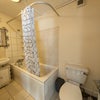 Photo 9: Bath Tub & Toilet