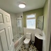 Photo 8: Bathroom Downstairs w/ Bath Tub
