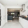 Photo 7: Communal Kitchen and Living Area