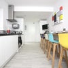 Photo 7: Communal Kitchen and Living Area