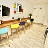 Photo 6: Communal Kitchen and Living Area
