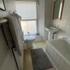 Photo 3: Your own bathroom with shower and also bath