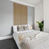 Photo 2: Double ottoman style bed, perfect for storage!
