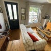 Photo 7: Front lounge. The road is a cul-de-sac, so no passing traffic 