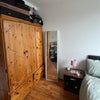 Photo 3: Room 1- mirror is now fixed to wall just above