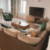 Photo 3: Spacious open-plan living area