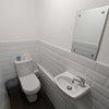 Photo 9: Ground floor cloakroom