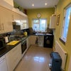 Photo 5: Spacious kitchen looking onto the garden.