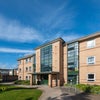 Photo 2: Alcuin block H. Flat 6 is top floor on right