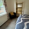 Photo 4: double bed with draws + IKEA desk and chair with over head storage with downlights over bed and desk