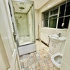 Photo 8: Downstairs toilet and shower 