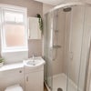 Photo 9: Downstairs bathroom
