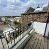 Photo 6: North facing balcony with views over Stokey