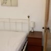 Photo 6: bed in relation to door