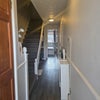 Photo 6: Dowstairs hallway