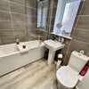 Photo 7: Shared Bathroom