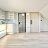 Photo 5: Contemporary kitchenette with stylish modern finishes.