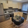 Photo 2: Kitchen & Socializing area