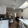 Photo 3: Kitchen and living space