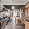 Photo 3: Kitchen into dining/lounge