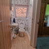 Photo 5: Toilet and sink next to Bedroom