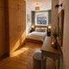 Photo 7: Bedroom 4 with private kitchen lounge 