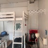 Photo 2: Bunk bed for elevated storage 