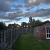 Photo 3: Garden with outhouse 