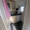 Photo 8: Backroom/laundry room