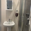 Photo 5: Downstairs shower/toilet