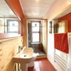 Photo 7: funky orange bathroom
