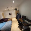 Photo 2: Bedroom / Fitted wardrobe / Ample storage / Sofa / Table 