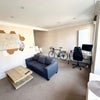Photo 5: Living room with space for bike storage 