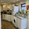 Photo 4: Kitchen with dishwasher and washing machine