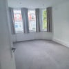 Photo 5: Larger bedroom (£1295)
