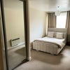 Photo 2: Bedroom with built in wardrobe