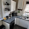 Photo 9: Kitchen. Electric hob and oven. Big washing machine 
